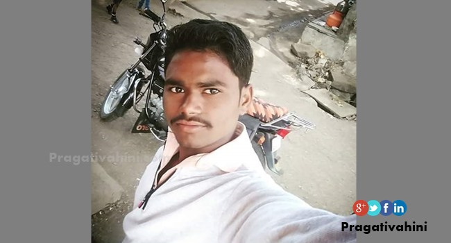 A snake bites a young man in flood water